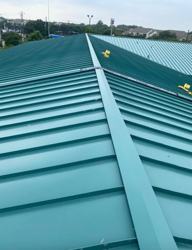 Green commercial metal roof ridge and valley for Metal Roof Repair in Imperial